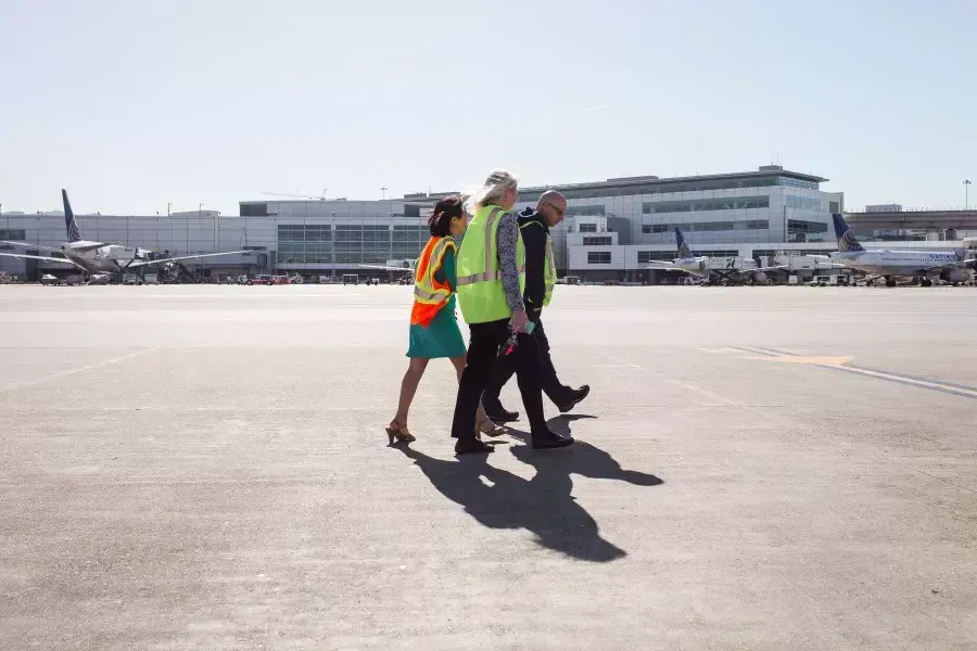 Melinda Yee Franklin walking on the SFO runway.